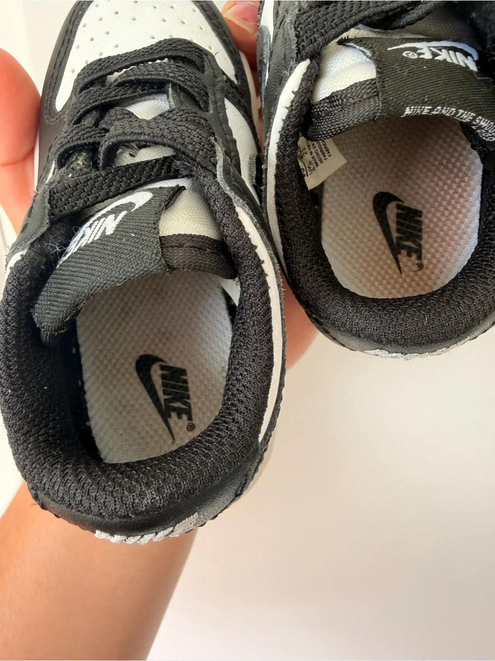 Nike Kids Black and White Low-Top Sneaker with Swoosh
